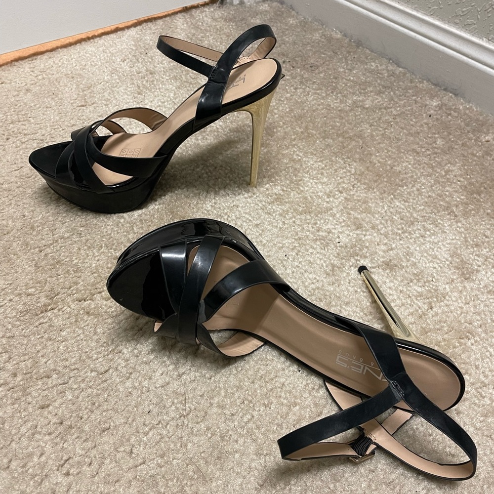 Standout black shoes with golden heels